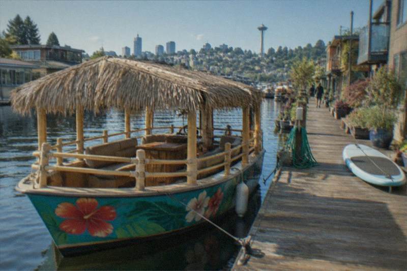 Private charter boat cruising Lake Union with a small party aboard; this category collects four bookable charters, three priced per group from $289, from a one-hour sightseeing run to a tiki boat that takes up to 15 guests.