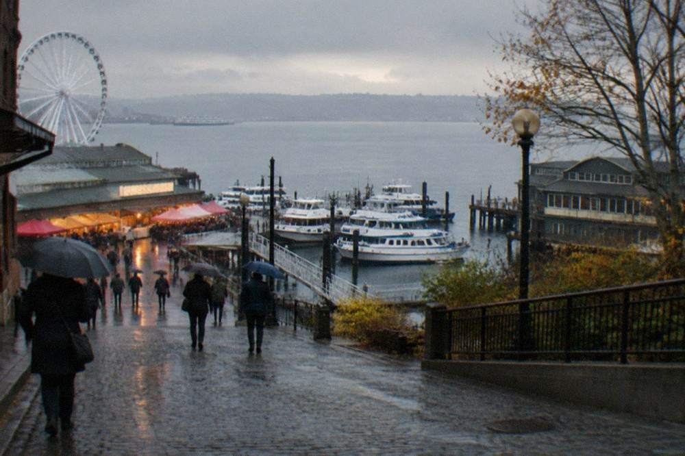 View over Pike Place Market toward Elliott Bay with moored boats along the waterfront
