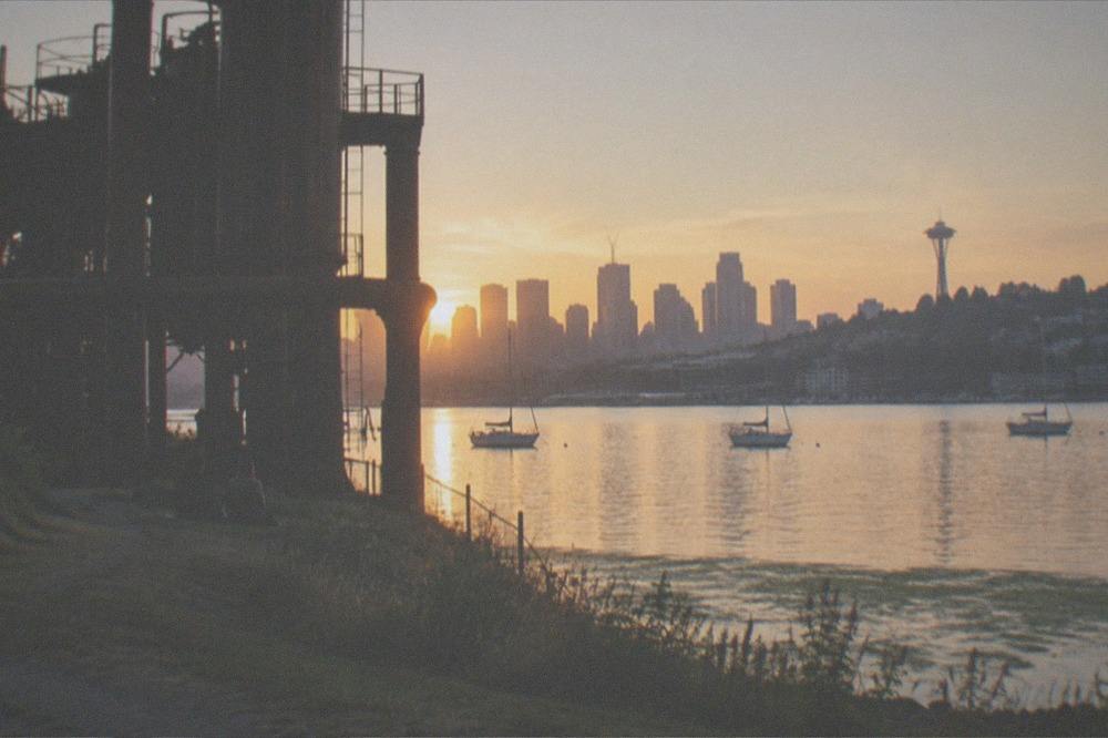The Seattle skyline seen across Lake Union from the water at golden hour